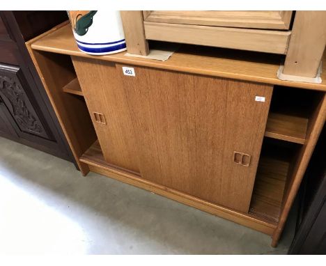 A small sliding door cabinet