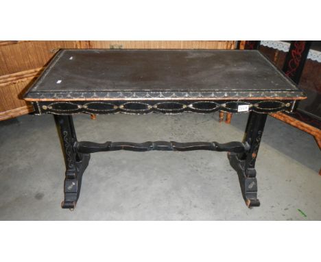 A lacquered console table.