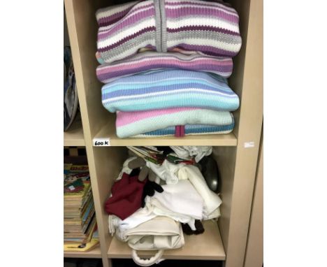 A quantity of ladies cardigans (some new) and a shelf of scarves, gloves etc. (most new)