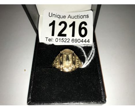 A 10ct/5.1 gold U.S.A college ring, size R.