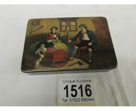 A snuff box with continental scene.