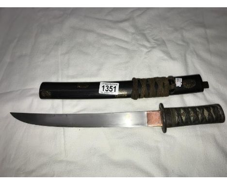 A small Tanto with shagreen handle and wood scabbard.