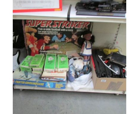 A quantity of vintage games including Airfix Fighter Command game, Parker Super Striker, Subbutteo items, Scalextric items, R