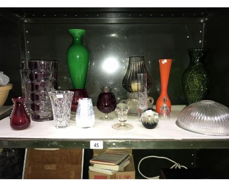 A shelf of art glass including vases &amp; paperweights etc.