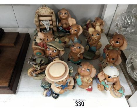 A collection of 12 Pendelfin figurines including Sudsey &amp; Sweep