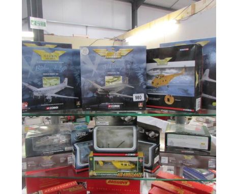 A good collection of 12 Corgi Aviation Archive models and 6 other aircraft models (2 shelves).