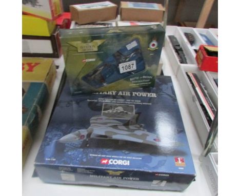 A Corgi 48301 military air power Avro Vulcan bomber and a 49503 Battle of Britain Memorial Flight (BBMF) Spitfire and Hurrica
