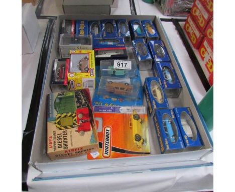 A quantity of boxed 1:76 scale diecast model cars.