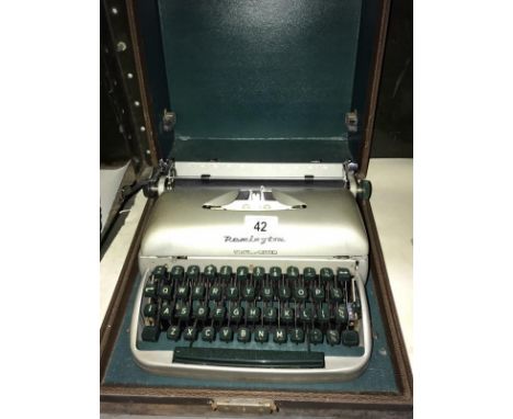 A Vintage Remington travelwriier cased typewriter