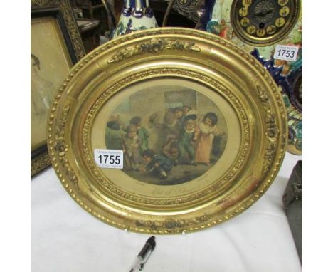 A gilt framed and glazed oval Victorian print entitled 'Out of School'.