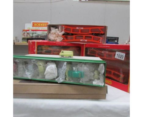 7 boxed Hornby R.666 Cartic Artic car carrier with spare cars.