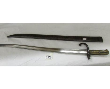 An old French bayonet with scabbard.