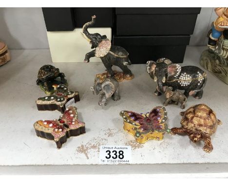 A collection of 9 trinket boxes including Hidden Treasure