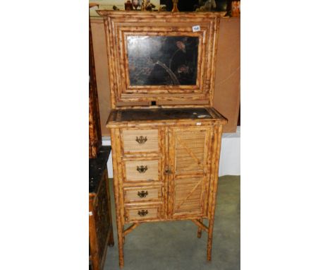 A bamboo cupboard having 4 small drawers and a single door.