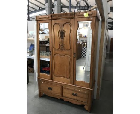 A satin walnut wardrobe with 2 door centre panel