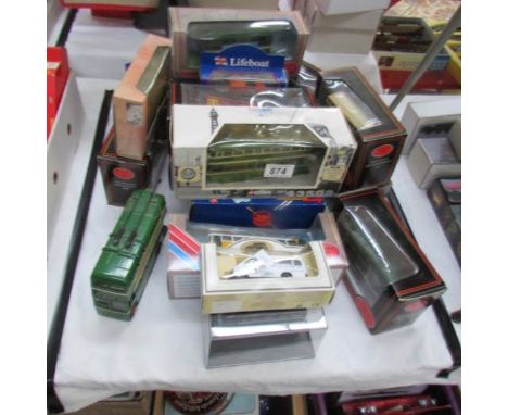 A collection of die cast bus models including Corgi and 2 ship models.