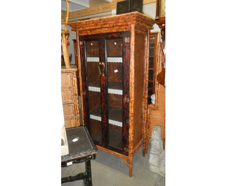 A bamboo 2 door cabinet.