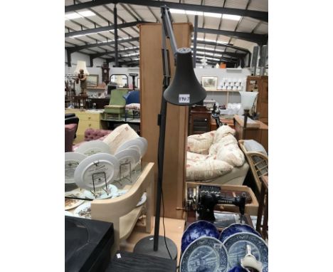 A floor standing angle poise lamp