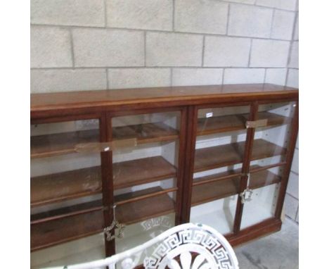 A large 4 door glazed antique mahogany shop display case, apothecary