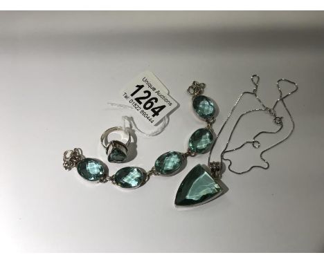 An Apatate silver ring, bracelet and pendant.