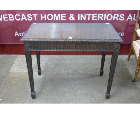 An Edward VII Chippendale Revival mahogany table