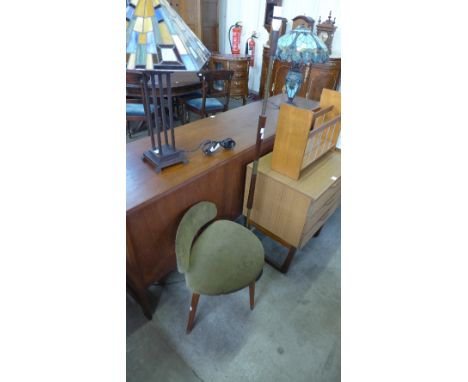 A teak magazine rack, standard lamp, chair and mirror