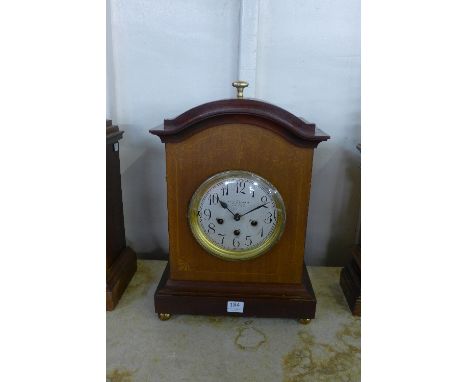 An early 20th Century Junghans inlaid mahogany bracket clock, retailed by Butcher & Swan, 9 Market St., Nottingham