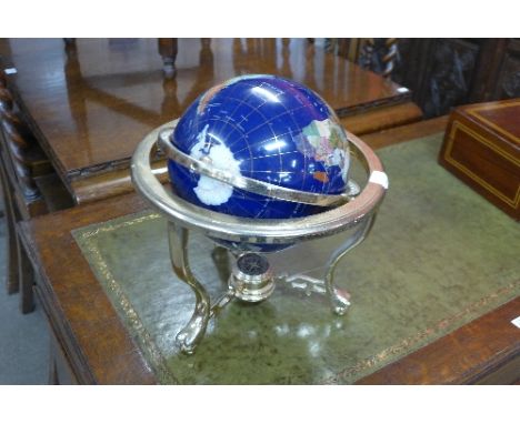 A gem set terrestrial globe