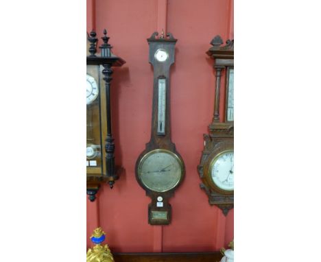 A Victorian rosewood banjo barometer, the silvered dial signed S. Bernascone, Leeds, retailed by J.P. Cotts & Sons, Opticians