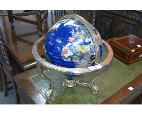 A gem set terrestrial globe