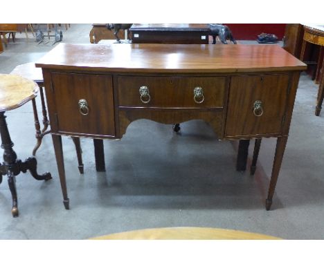 A George III style mahogany bow-front sideboard