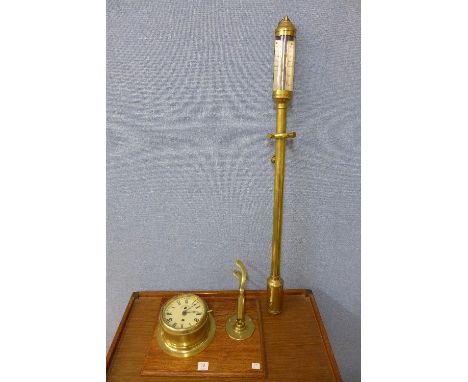 A brass 8-day ship's clock, bearing Royal Navy inscription and barometer, signed FFBLM, 16 a 22, R.N. Disterro, Lisbon