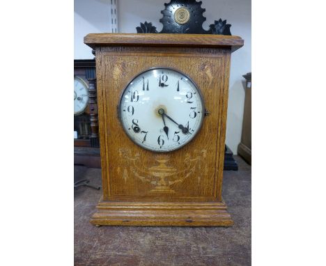 A 19th Century American Gilbert Clock Co. inlaid oak bracket clock