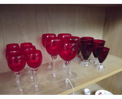 Shelf of red glassware 