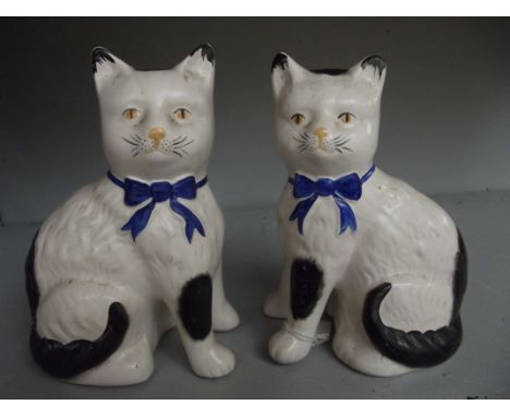 Pair of ceramic cats 