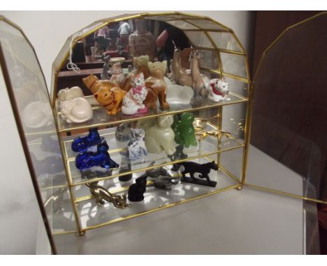 Cased collection of model cats.