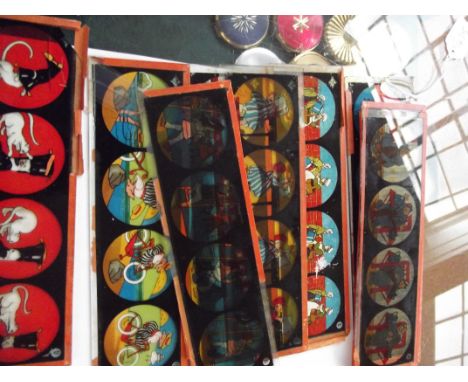 Collection of 11 glass children's magic lantern slides 