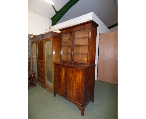George III mahogany part glazed bookcase, the lower section fitted with 2 short & 3 long graduated drawers on splayed bracket