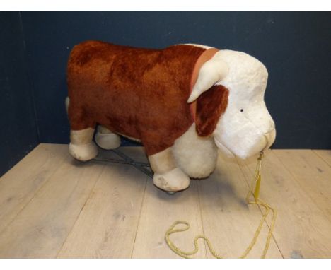 Large 1960's 'Merrythought' model of Hereford bull on rolling wheels 60Hx103W PLEASE always check condition before bidding or