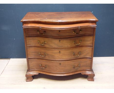 Good George III mahogany serpentine front chest of 4 long graduated drawers beneath a brushing slide on shaped bracket feet 9