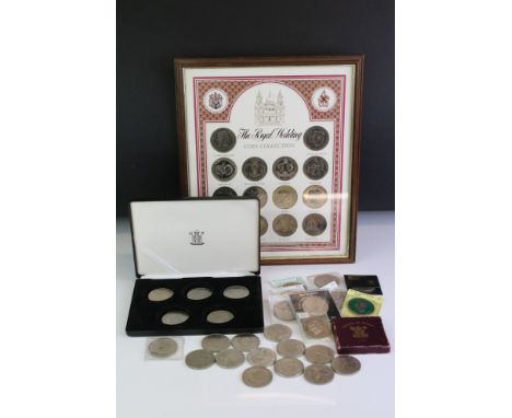 A collection of British commemorative crowns to include an enamel 1951 'Festival of Britain' example together with a framed R