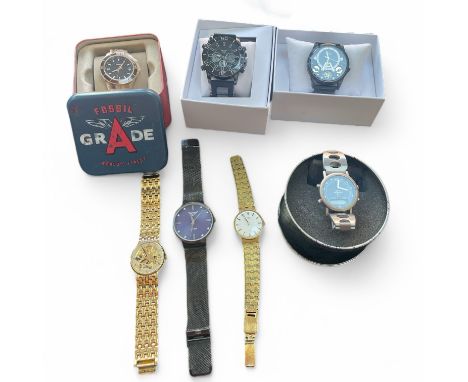 A collection of seven wristwatches. Comprising an unworn Fossil Stella Brown dial, resin bracelet watch ES3090, in original b