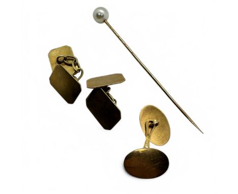 A pair of precious yellow metal cufflinks, unmarked, together with a single "750" stamped cufflink and a cultured pearl set s