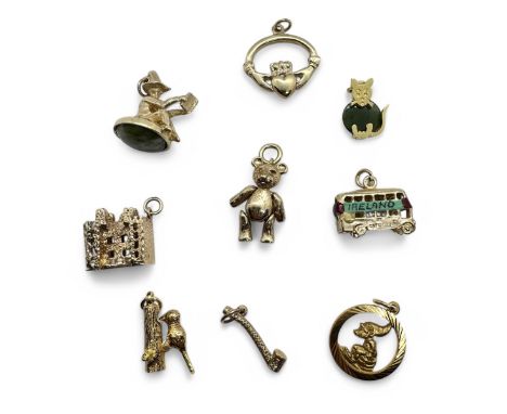 A collection of nine 9ct gold charms, each hallmarked. Comprising an articulated teddy bear; a woodpecker; a Claddagh design 