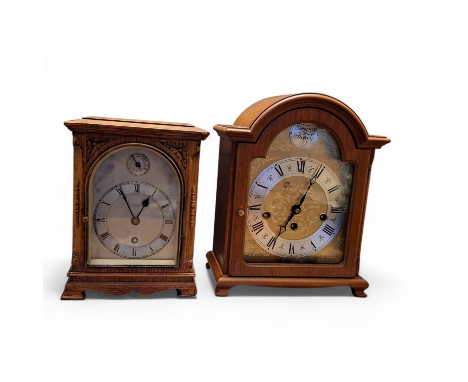 An Irvine Hindle of Halifax free standing  mantle  none chiming clock with Roman Numerals, front glass hinged door . stands 2
