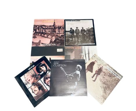 A collection of vinyl records. To include LPs including the 1981 cast recording of Cats; Simon & Garfunkel Sounds of silence;