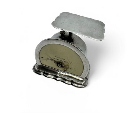 An Edwardian sterling silver set of postal scales.  Marked for Levi & Salaman, Birmingham 1905. With a rubbed faux ivory dial