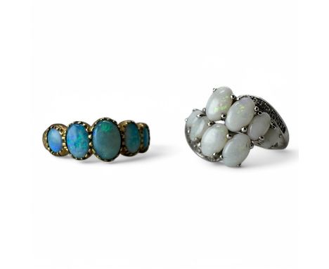 Two 9ct gold Opal set dress rings. Comprising a 9ct yellow gold five stone opal ring, size P; together with a 9ct white gold 
