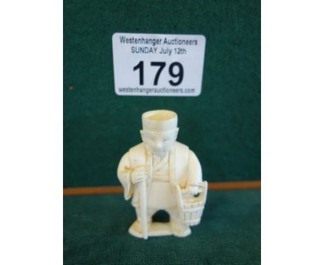 Small carved ivory Netsuke of a Man holding a basket 2" tall you can now bid live on all our lots via thesaleroom.com Westenh