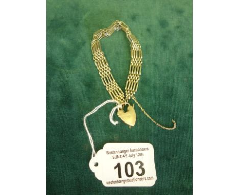 Ladies gate bracelet united by a heart shaped locket, 9ct gold 15 grams approx you can now bid live on all our lots via thesa